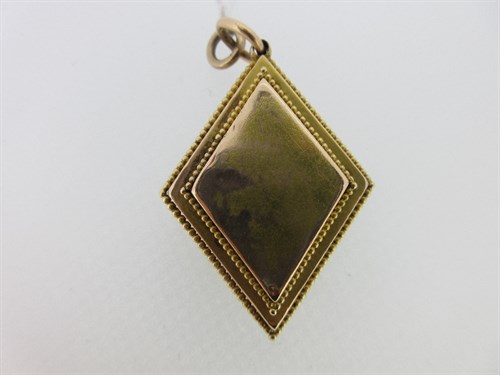 Lot 322 - A Victorian lozenge-shaped hinged locket