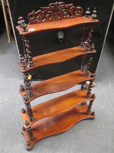 Lot 364 - A Victorian rosewood three tier graduated...