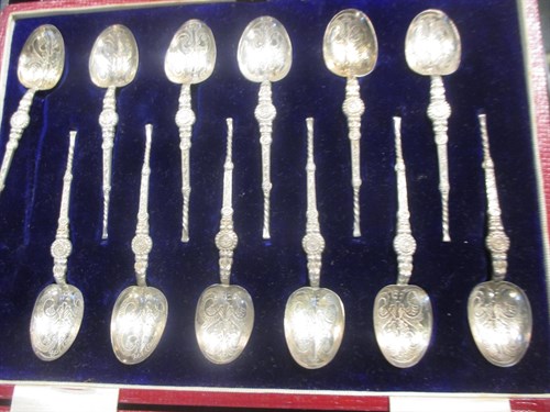 Lot 199 - A cased set of 12 silver coffee spoons, a pair...