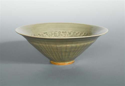 Lot 48 - A Northern Song-Jin dynasty Yaozhou celadon moulded conical bowl