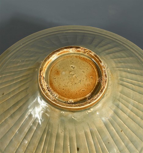 Lot 48 - A Northern Song-Jin dynasty Yaozhou celadon moulded conical bowl