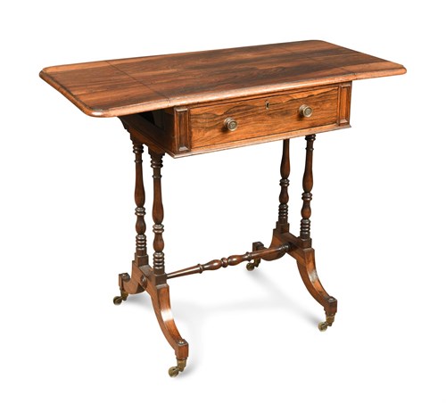 Lot 454 - A Regency rosewood writing table