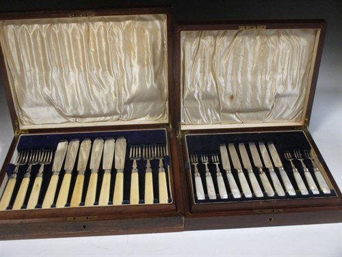 Lot 217 - A set of twelve George V silver dessert knives...