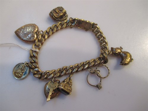 Lot 159 - A curb bracelet marked '750' and testing to...