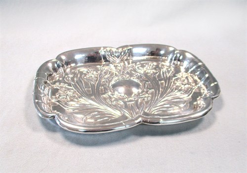 Lot 97 - An Edward VII Art Nouveau silver dressing table tray