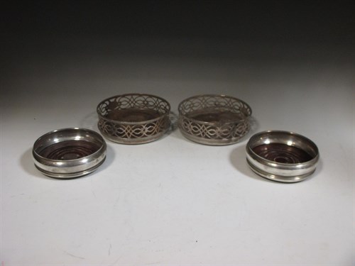 Lot 216 - A pair of modern silver bottle coasters by...