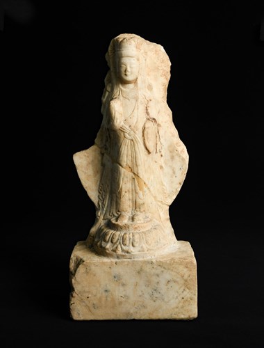 Lot 282 - A white marble figure of a standing Bodhisattva