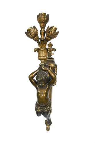 Lot 299 - A pair of late 19th or early 20th century bronze wall lights