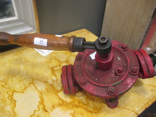 Lot 129 - A red painted cast iron hand crank Well pump