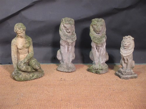 Lot 420 - A pair of reconstituted stone guard lions, a...