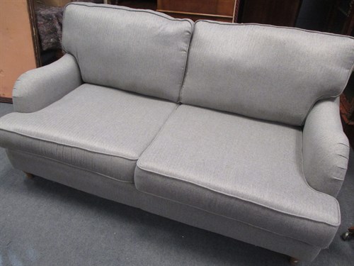 Lot 346 - A modern and little used DFS grey sofa, 175cm