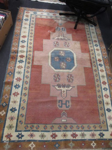 Lot 438 - A Kazak style rug with plain field 190 x 124cm