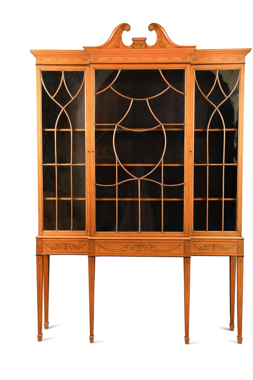 Lot 413 - A late 19th century satinwood and inlaid breakfront display cabinet