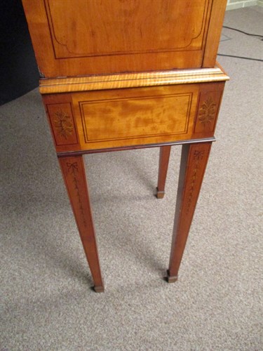 Lot 413 - A late 19th century satinwood and inlaid breakfront display cabinet