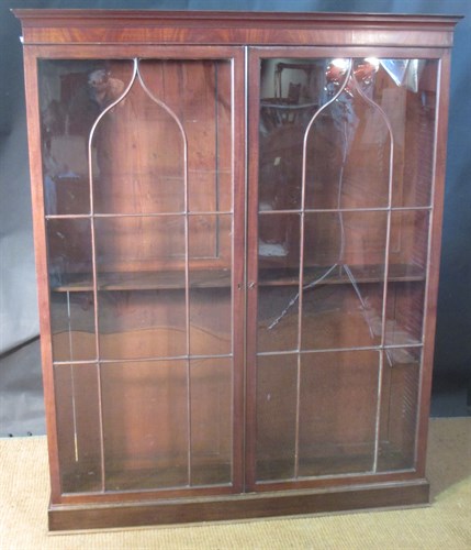 Lot 361 - A George III mahogany bookcase on later plinth...