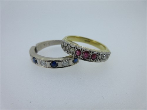 Lot 420 - A nine stone ruby and diamond ring and a seven stone sapphire and diamond ring