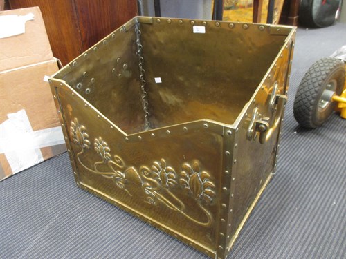 Lot 410 - A brass log box with applied decoration