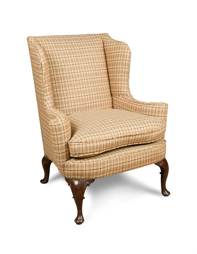 Lot 448 - A George III mahogany framed wing back armchair