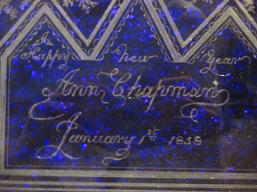 Lot 115 - A 19th century engraved blue glass panel,...
