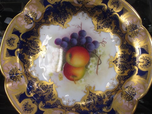 Lot 49 - A Royal Worcester cabinet dish painted with...