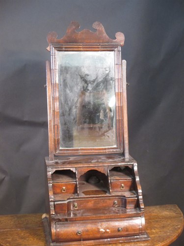 Lot 344 - A Queen Anne walnut dressing table mirror with...