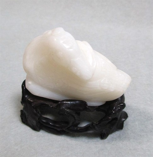 Lot 307 - A white jade duck , 19th century or later