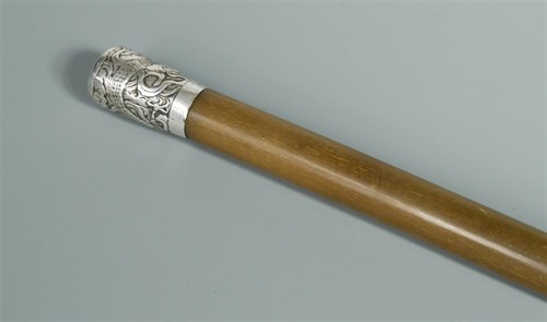 Lot 308 - A silver topped rhinoceros horn walking stick