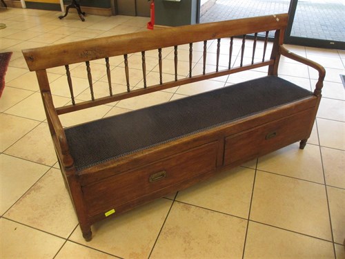 Lot 397 - A 19th Century ash settle with box base,...