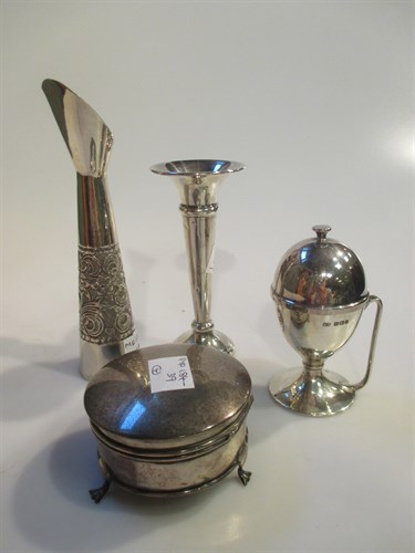 Lot 197 - An egg cup with cover, a ring box and two bud...