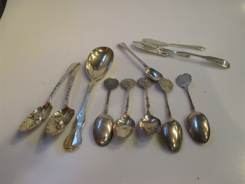 Lot 198 - A pair of silver gilt berry spoons, three...
