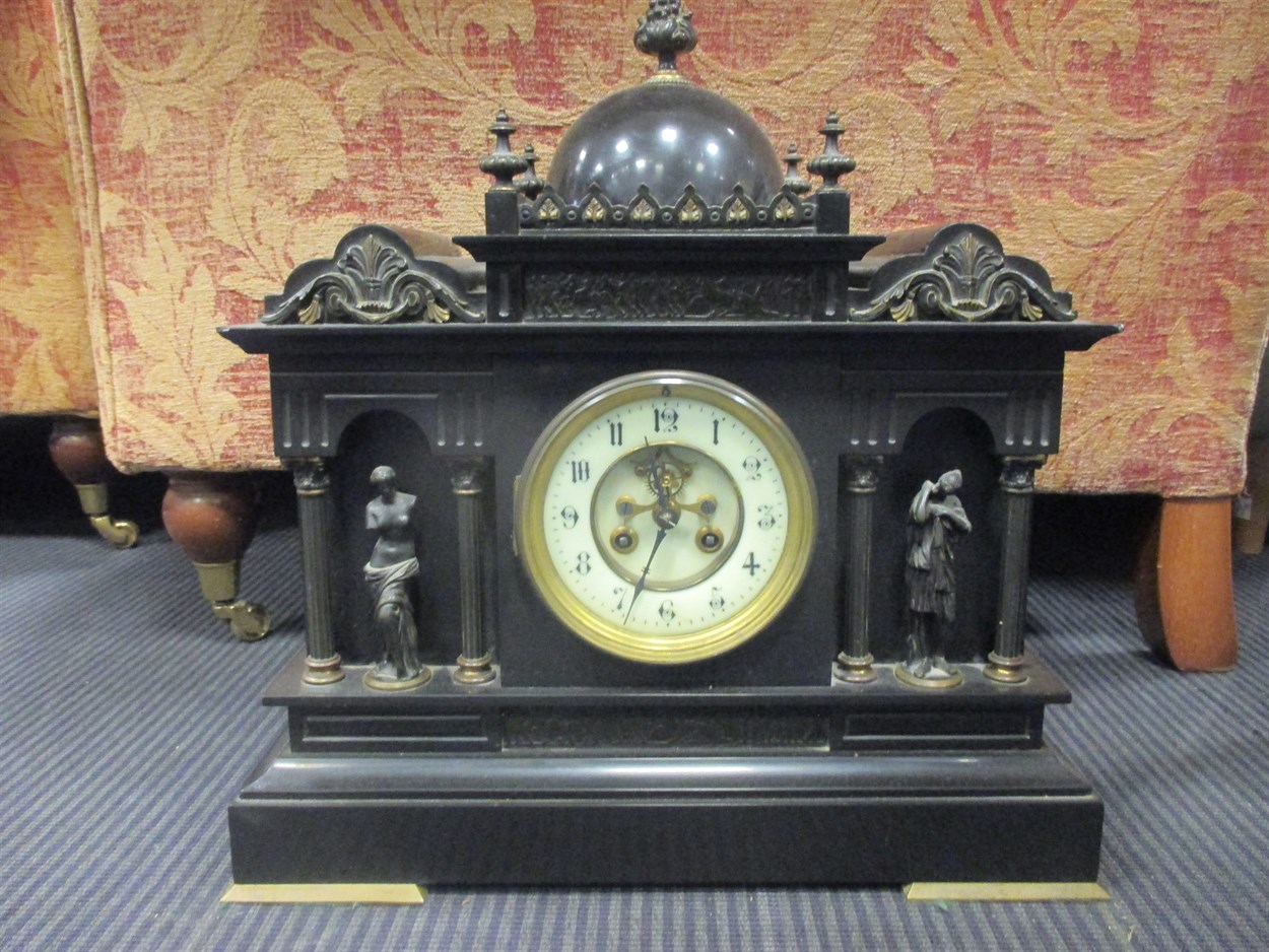 Lot 480 - A late 19th French black marble mantle clock...