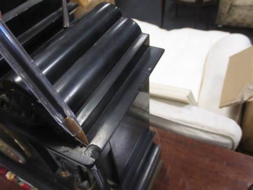 Lot 480 - A late 19th French black marble mantle clock...