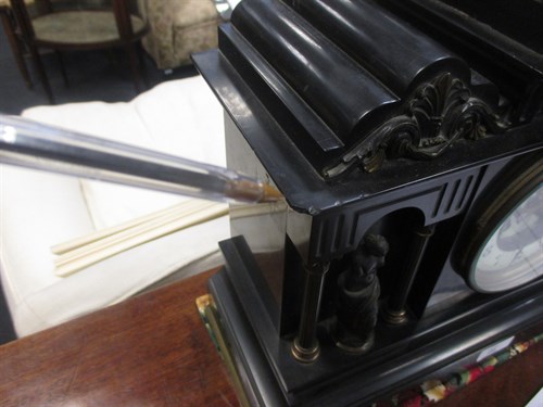 Lot 480 - A late 19th French black marble mantle clock...