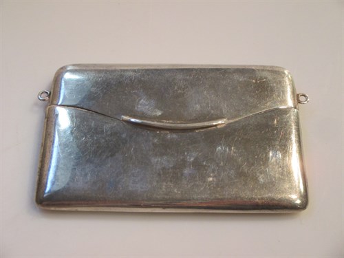 Lot 195 - An Edwardian silver purse-shape note or card case