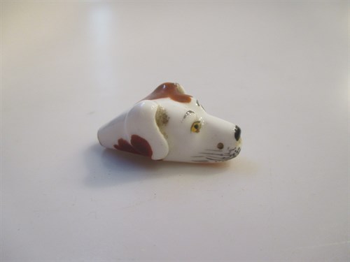 Lot 70 - A miniature 19th century porcelain dogs head...