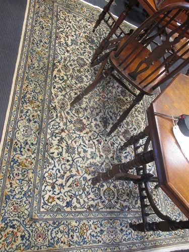 Lot 436 - A cream ground fine Kashan, 2.24 x138cm