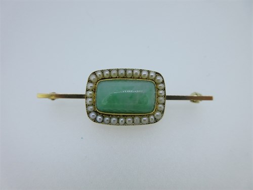 Lot 91 - A jade and seed pearl bar brooch with a late Georgian memorial inscription