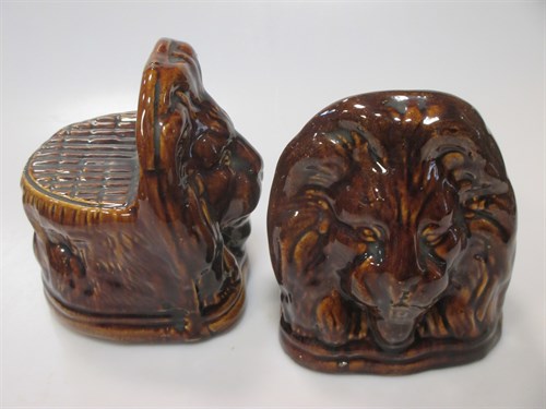 Lot 86 - A pair of Wheilden treacle glazed Lion mask...