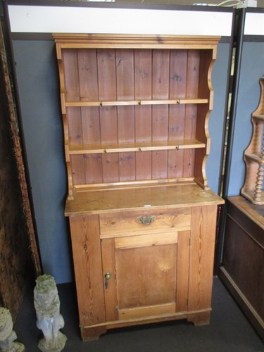 Lot 393 - A pine cupboard with later plate rack, 183 x...