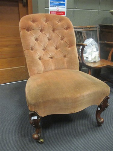Lot 415 - A Victorian nursing chair on short cabriole legs