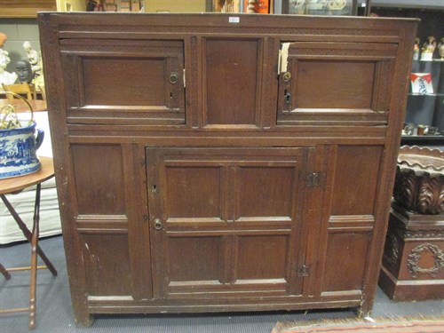 Lot 423 - A 17th century wainscote oak court cupboard...
