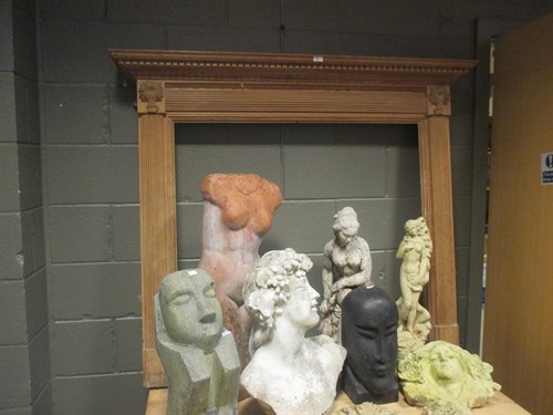 Lot 424 - A George III style carved pine chimney piece...