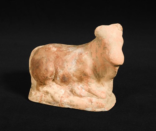 Lot 273 - An Egyptian terracotta Recumbent Bull