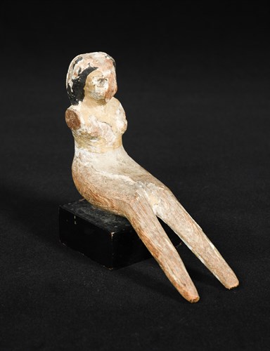 Lot 182 - An Egyptian wood seated female