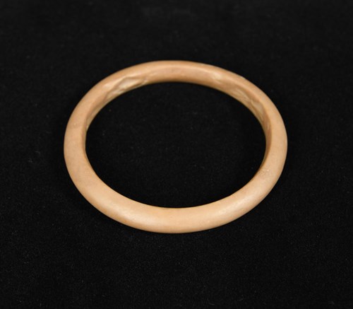 Lot 276 - An Egyptian stone bangle