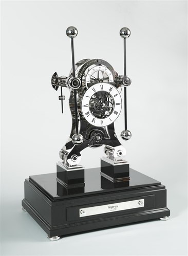 Lot 371 - A Rhodium plated Navigator skeleton timepiece by Comitti, for Asprey