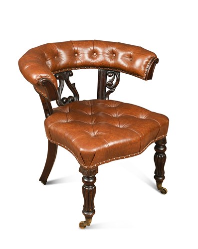 Lot 434 - A William IV bow back desk chair, with tan...