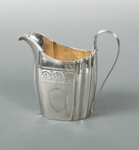 Lot 44 - A George III silver cream jug