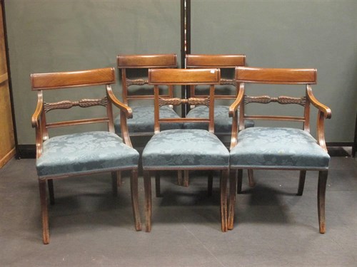 Lot 397 - A set of five Regency mahogany bar back dining...