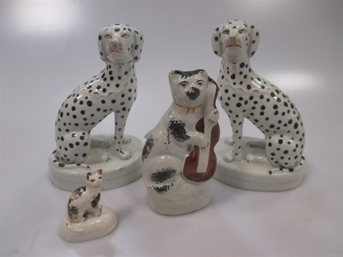 Lot 75 - A pair of Victorian Staffordshire pottery...